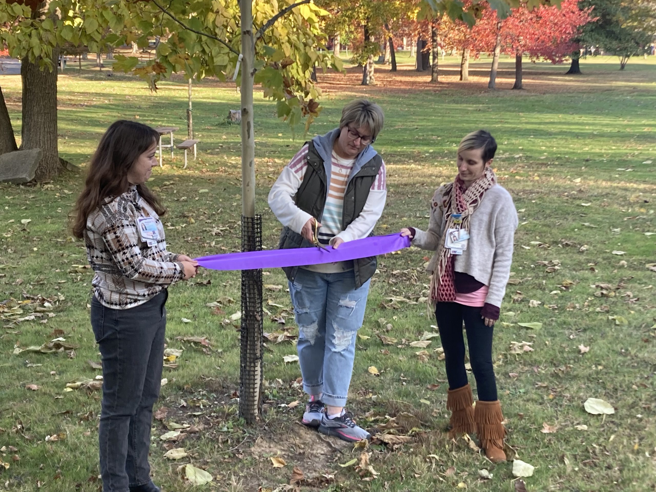 Makennas HUGS tree dedication ribbon cutting